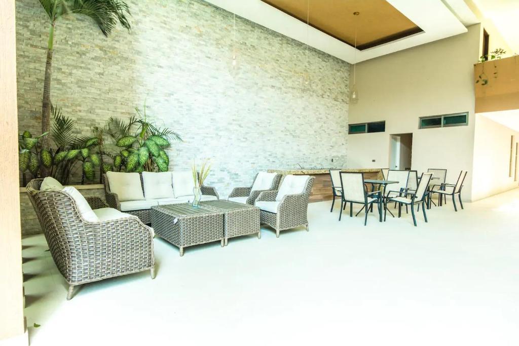 Apartahotel Palmarena &